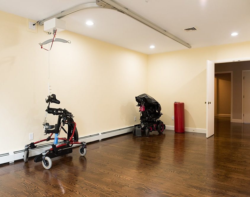 Guldmann Ceiling Lift installed in client’s exercise room