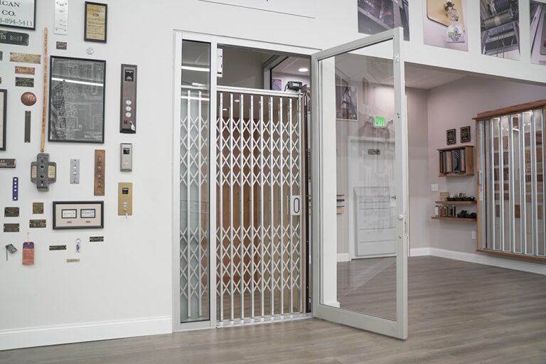 Elevator Showroom showing scissor style gate in clear/silver aluminum